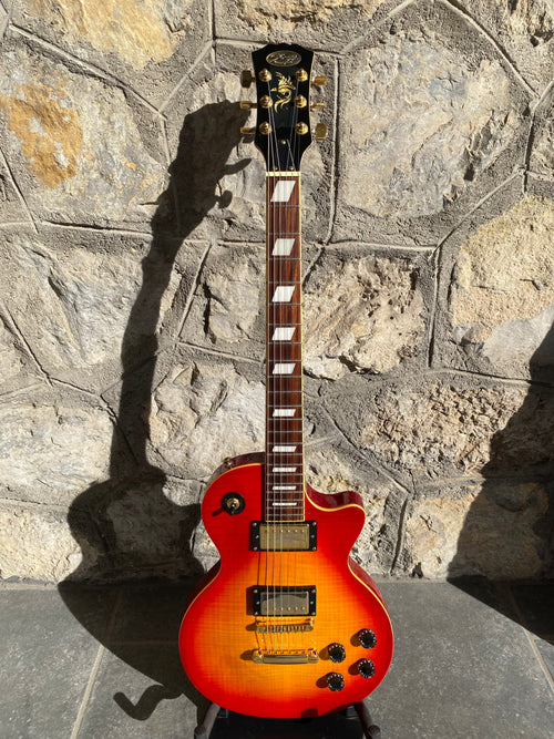 Stagg Les Paul Electric Guitar — Orange Burst, Flame Top, Gold Hardware, Phoenix Headstock Inlay, Set-Neck + Video Demo