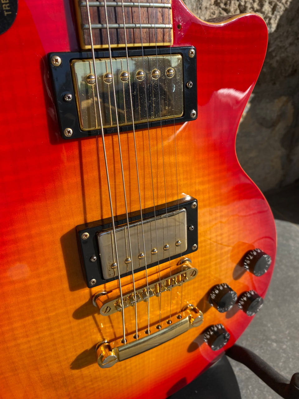 Stagg Les Paul Electric Guitar — Orange Burst, Flame Top, Gold Hardware, Phoenix Headstock Inlay, Set-Neck + Video Demo
